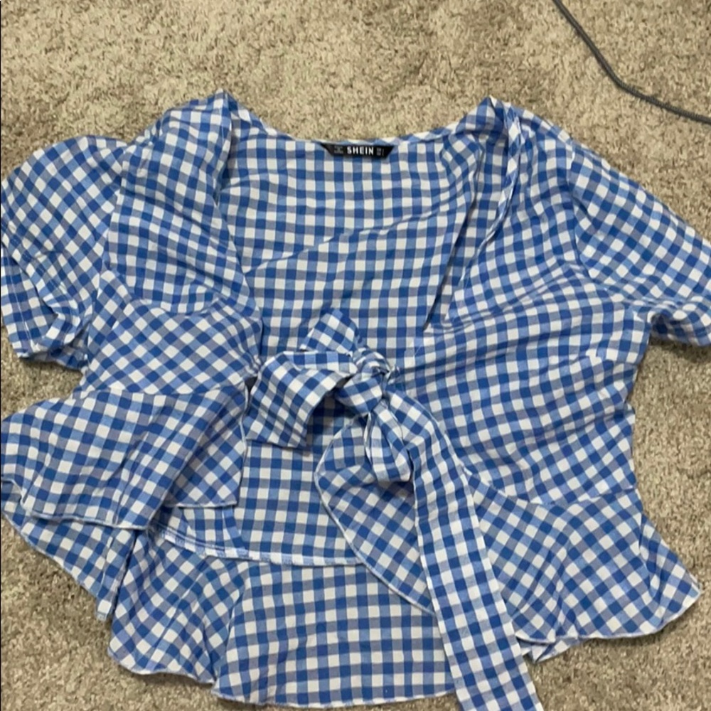checkered open blue and white top